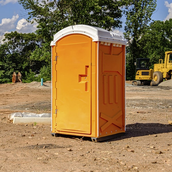 how often are the porta potties cleaned and serviced during a rental period in Hume